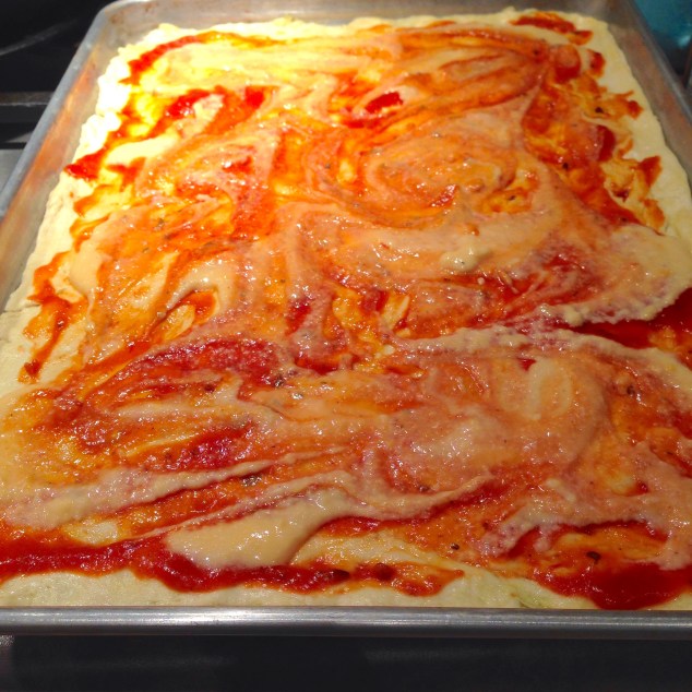 Pizza Crust with Sauce and Cheddar Cheese Sauce